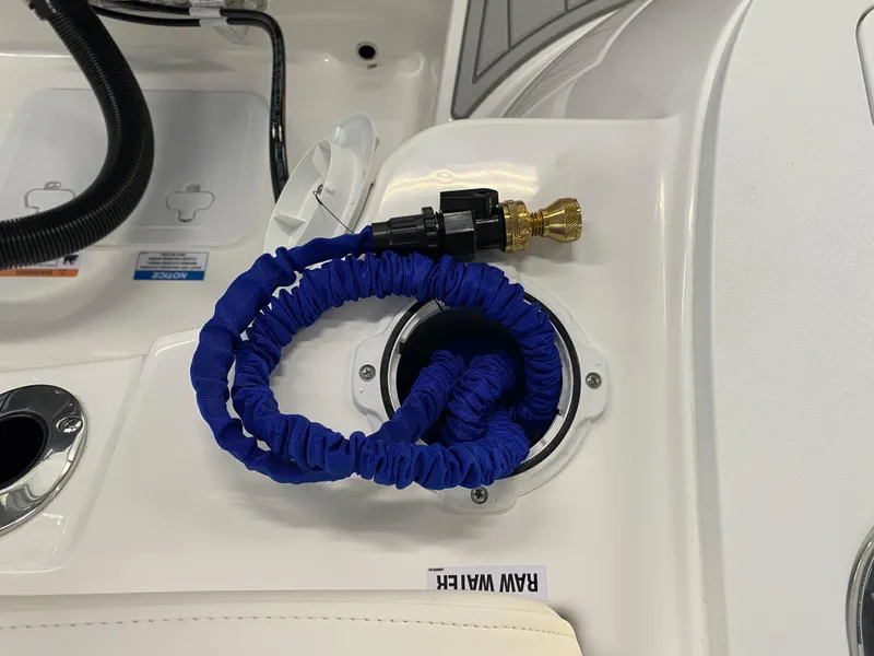 Slide: The Image of Blue hose in Sea Fox 228 Commander boat, 2025 model, labeled "RAW WATER." - 18