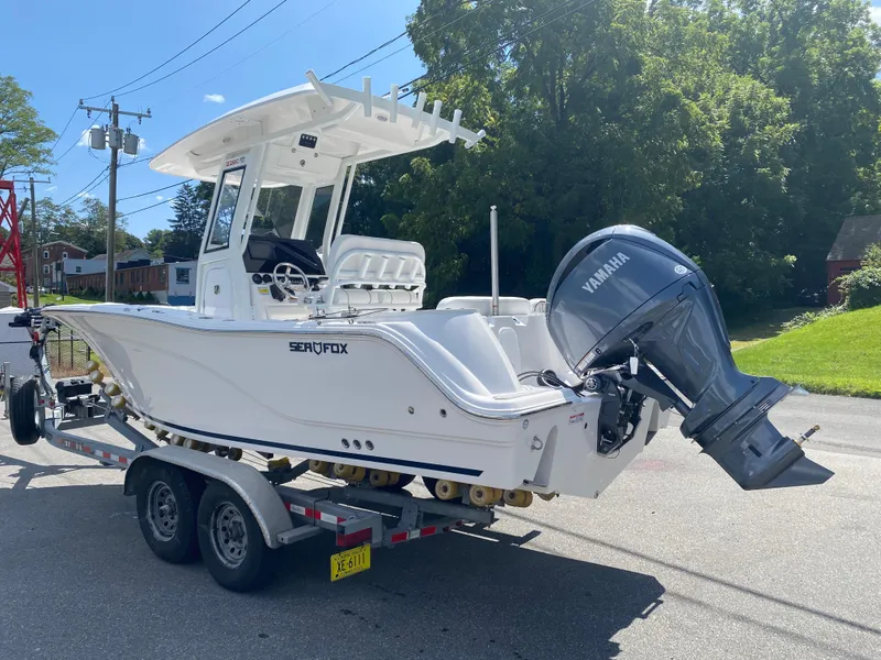 Slide: The Image of 2025 Sea Fox 228 Commander boat on trailer with Yamaha outboard motor. - 3