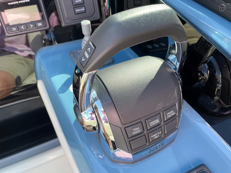 Slide: The Image of Throttle control of a 2022 Cranchi 26 Classic boat. - 16