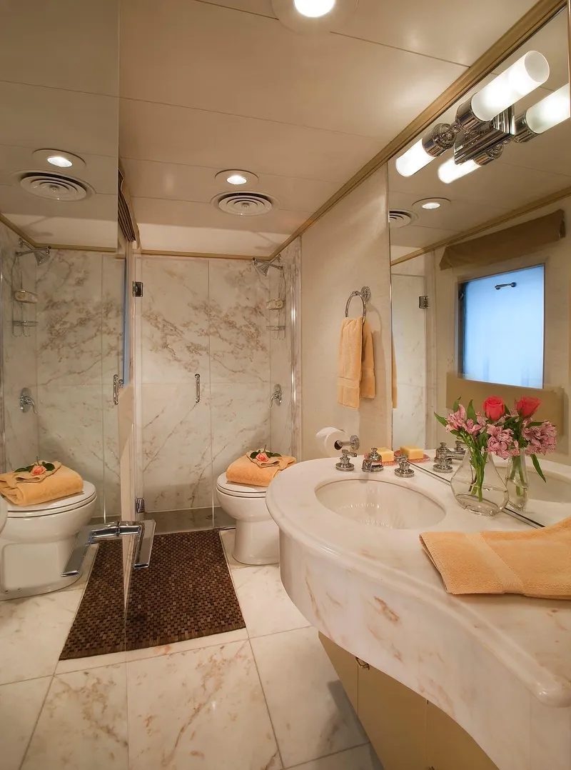 Slide: The Image of Luxurious bathroom on a 1967 Superyacht Punat with marble finishes and elegant decor. - 6