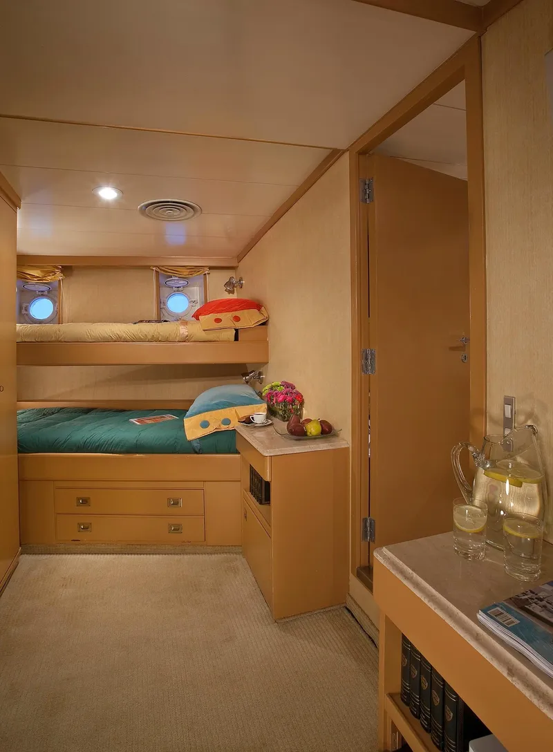 Slide: The Image of Cozy cabin interior of 1967 Superyacht Punat with bunk beds and porthole windows. - 8