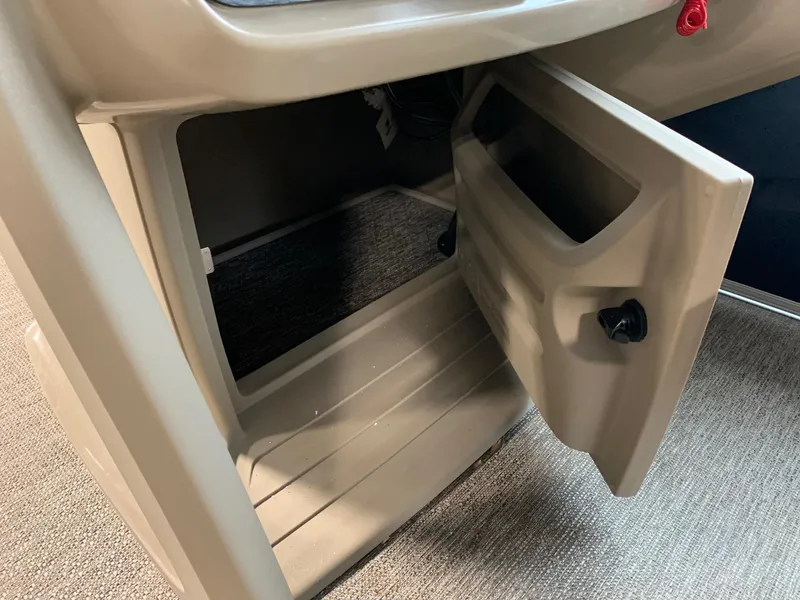 Slide: The Image of Open storage compartment in 2024 Starcraft LX20 R boat. - 7