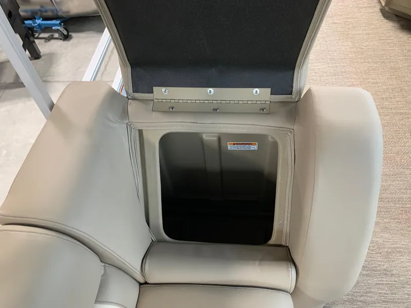 Slide: The Image of 2024 Starcraft LX20 R boat seat storage compartment. - 9