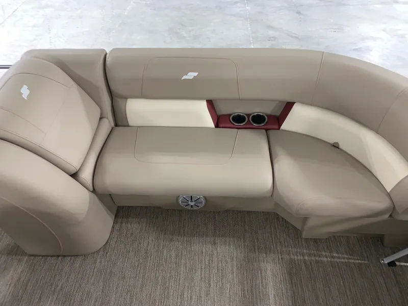 Slide: The Image of 2024 Starcraft LX22 F boat beige seating with cup holders. - 9