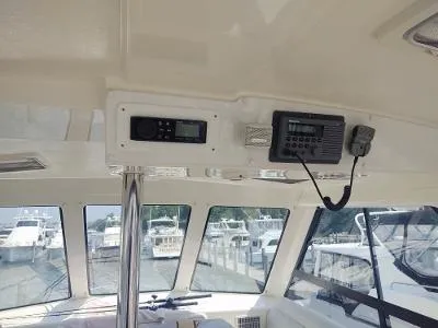 Slide: The Image of Interior view of 2003 Riviera 48 conv yacht with navigation equipment. - 11