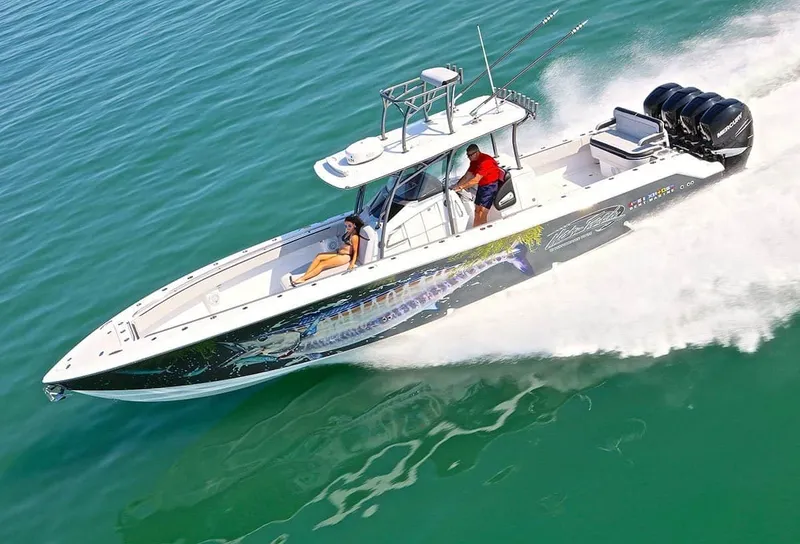 The Image of 2023 Nor-Tech 392 Super Fish boat speeding on water. - 1