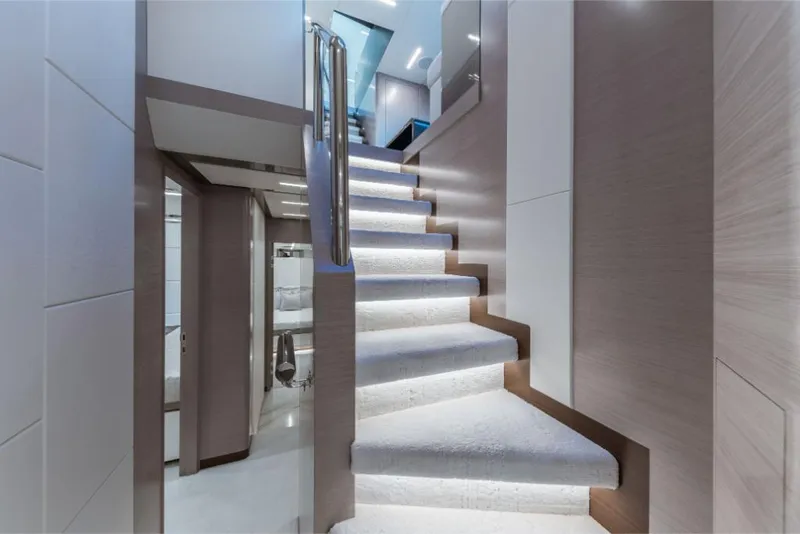 Slide: The Image of Modern staircase with LED lighting on the 2023 Ocean Alexander 35R yacht. - 17