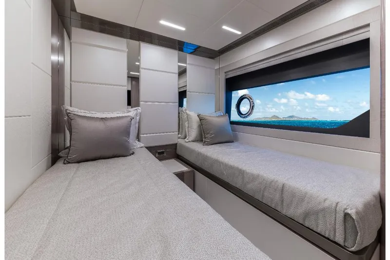 Slide: The Image of 2023 Ocean Alexander 35R twin bed cabin with ocean view window. - 19