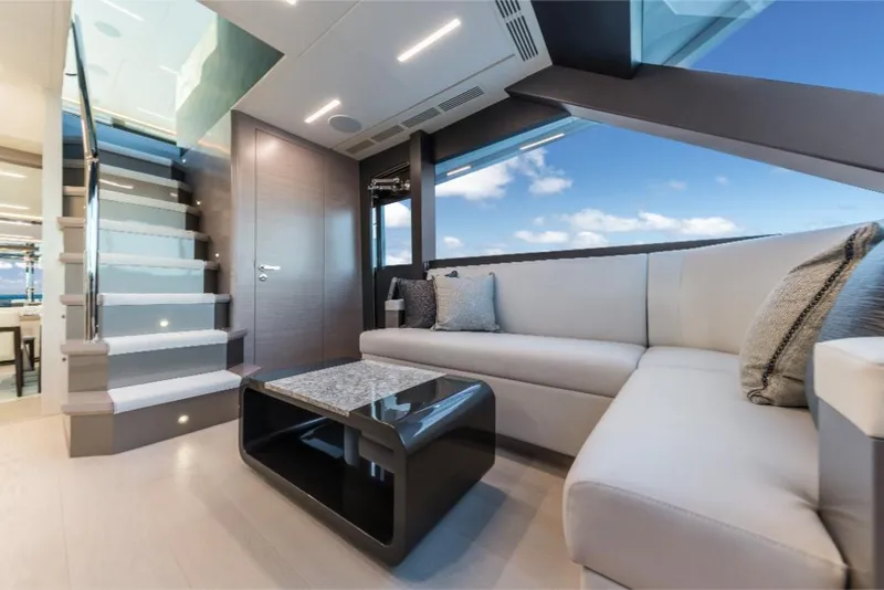 Slide: The Image of Luxurious interior of 2023 Ocean Alexander 35R yacht with modern seating and panoramic windows. - 22