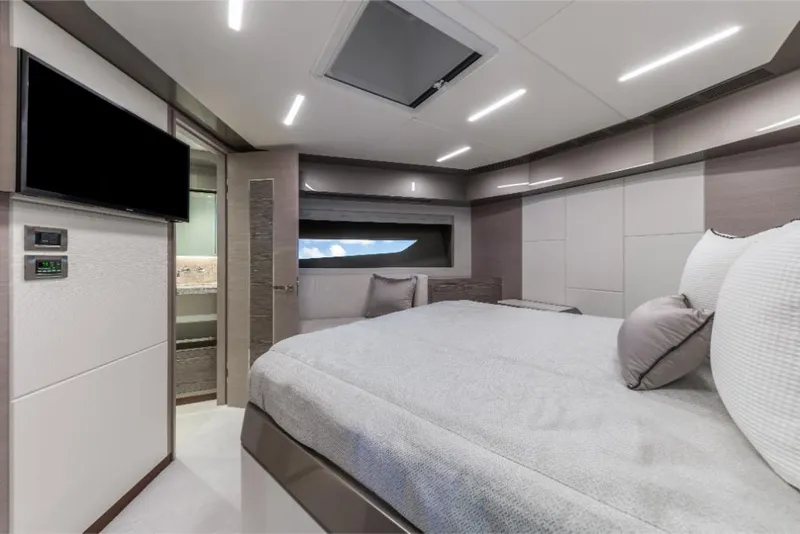 Slide: The Image of Luxurious bedroom interior of 2023 Ocean Alexander 35R yacht with modern design. - 24