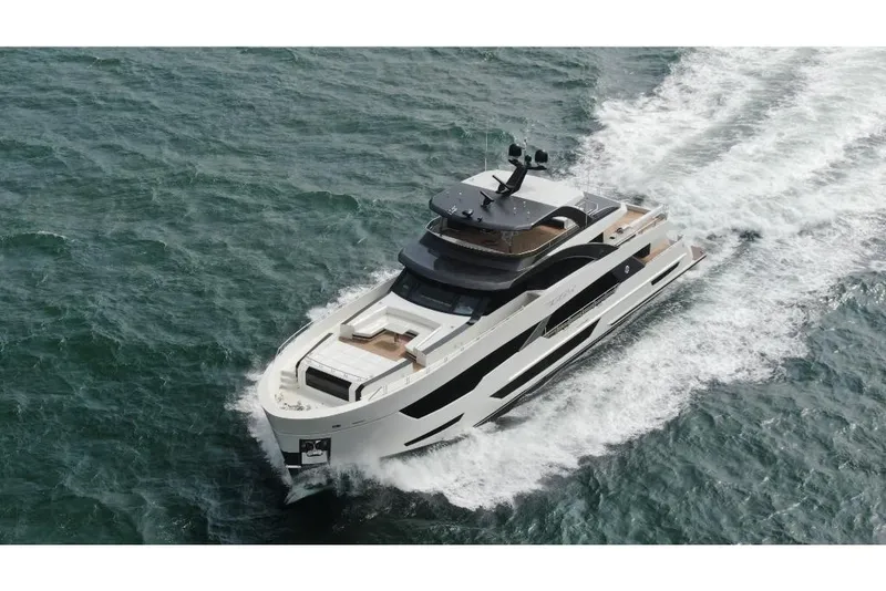 Slide: The Image of 2023 Ocean Alexander 35R luxury yacht cruising on open water. - 3