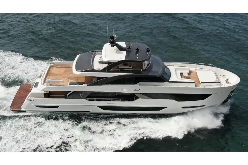 Slide: The Image of 2023 Ocean Alexander 35R luxury yacht cruising on the ocean. - 4