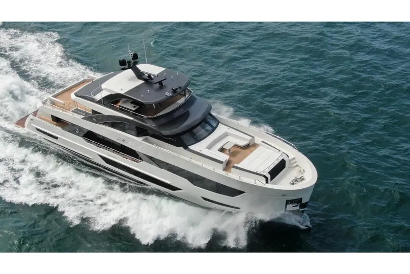 Slide: The Image of 2023 Ocean Alexander 35R luxury yacht cruising on the ocean. - 6