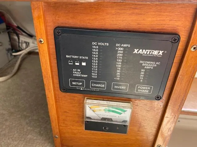 Slide: The Image of Control panel on a 1972 Bertram Express boat with Xantrex power management system. - 12