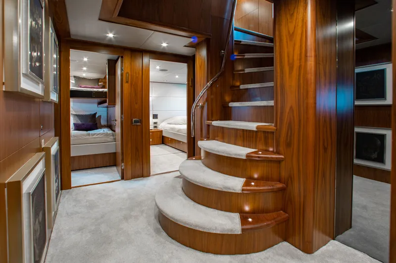 Slide: The Image of Luxurious interior of 2014 Sunseeker 131 yacht with wooden staircase and cozy bedrooms. - 19