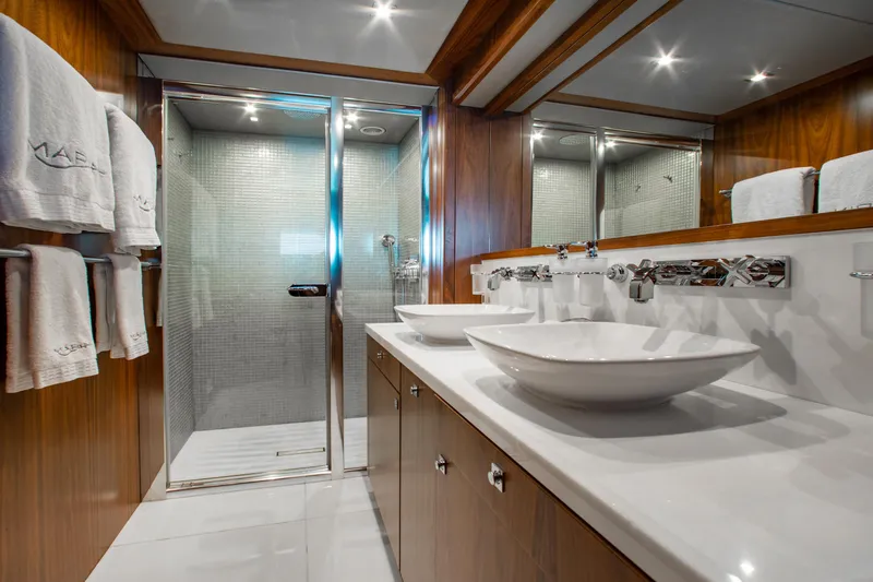 Slide: The Image of Luxurious bathroom in 2014 Sunseeker 131 yacht with dual sinks and glass shower. - 22