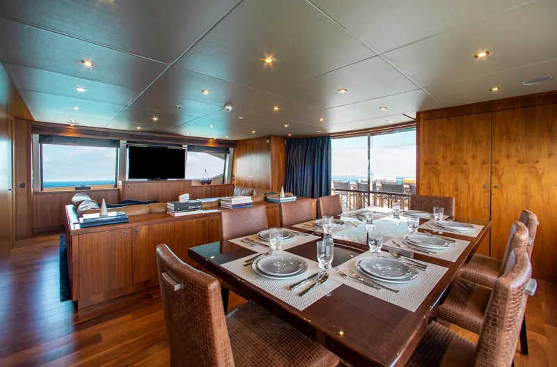 Slide: The Image of Luxurious dining area on the 2014 Sunseeker 131 yacht with ocean views. - 27