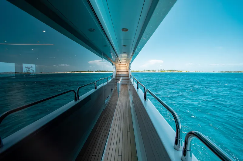 Slide: The Image of Side deck view of 2014 Sunseeker 131 yacht cruising on blue ocean. - 32