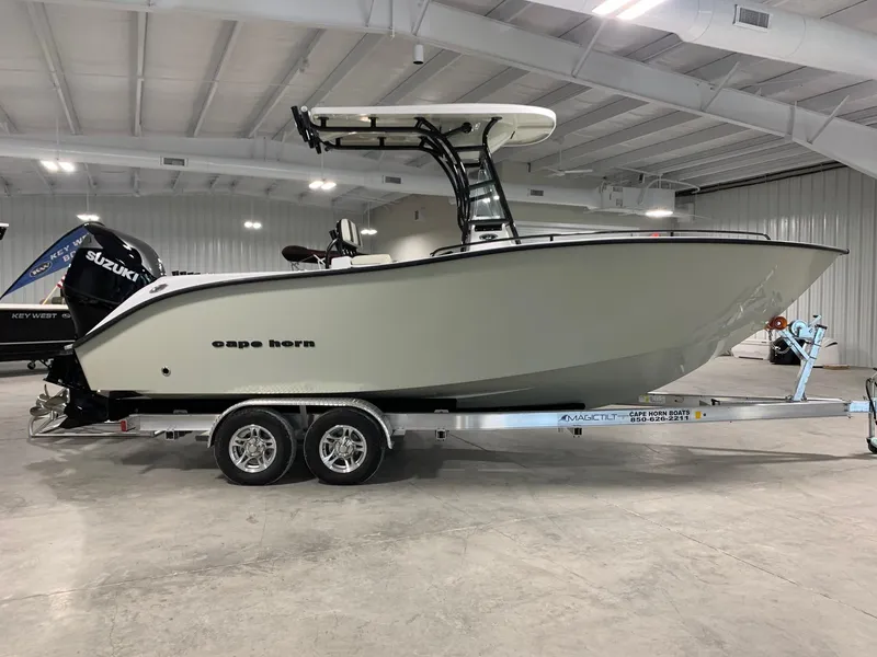 Slide: The Image of 2024 Cape Horn 22 OS boat on trailer in indoor showroom. - 0