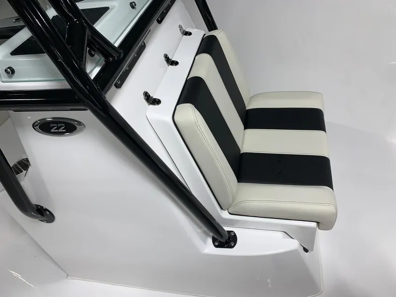 Slide: The Image of Cape Horn 22 OS 2024 boat with black and white striped seating. - 16