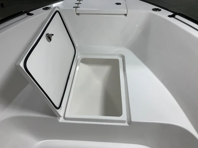 Slide: The Image of 2024 Cape Horn 22 OS boat with open storage compartment. - 17
