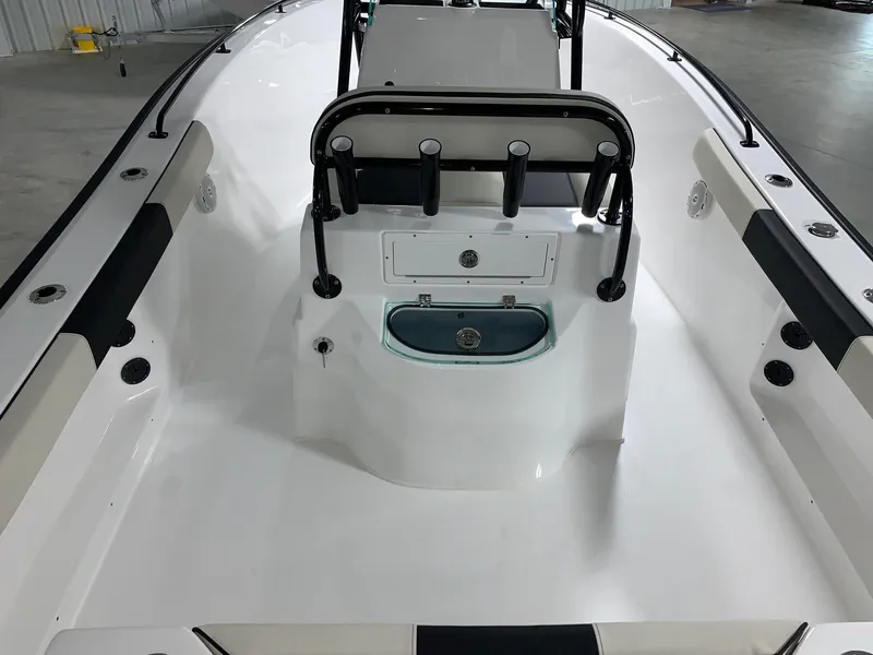 Slide: The Image of 2024 Cape Horn 22 OS boat interior with seating and storage compartments. - 4