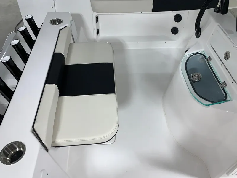 Slide: The Image of 2024 Cape Horn 22 OS boat interior with seating and rod holders. - 8