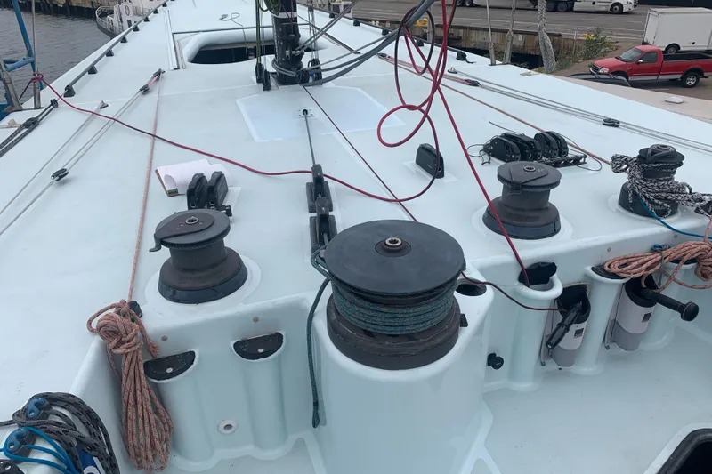 Slide: The Image of Deck of 2000 Custom Americas Cup Class 75 yacht with winches and ropes. - 16