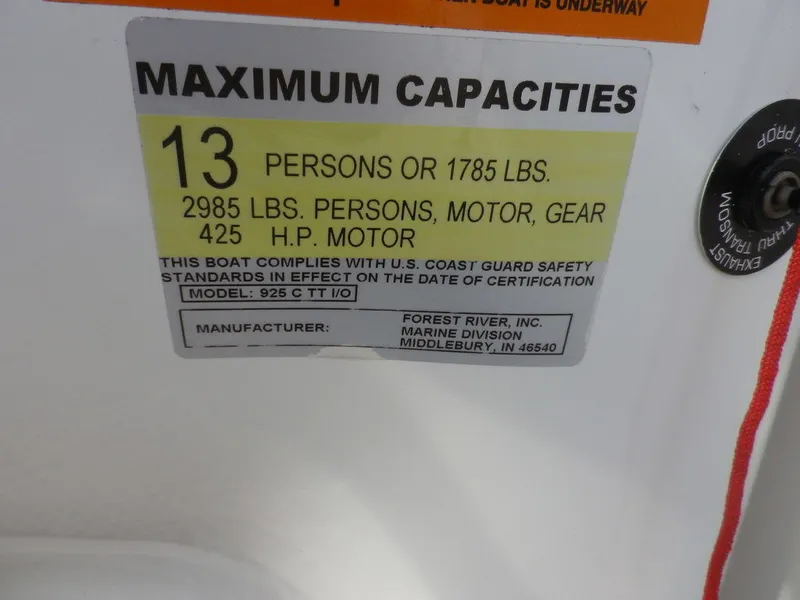 Slide: The Image of 2006 South Bay 925 boat capacity label, 13 persons or 2985 lbs, 425 HP motor. - 12