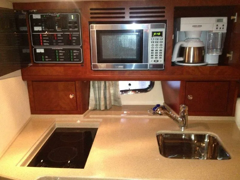 Slide: The Image of Galley Stove Burners, Sink, Microwave Oven - 13
