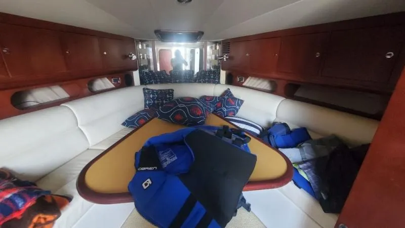 Slide: The Image of Interior of 2006 Chris-Craft 36 Corsair Heritage with cozy seating and vibrant cushions. - 37