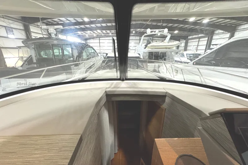 Slide: The Image of 2020 Tiara Yachts C49 Coupe interior view in a boat showroom. - 36
