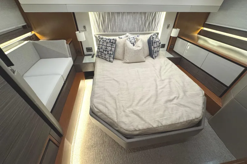 Slide: The Image of Luxurious bedroom interior of 2020 Tiara Yachts C49 Coupe with modern design and cozy bedding. - 59