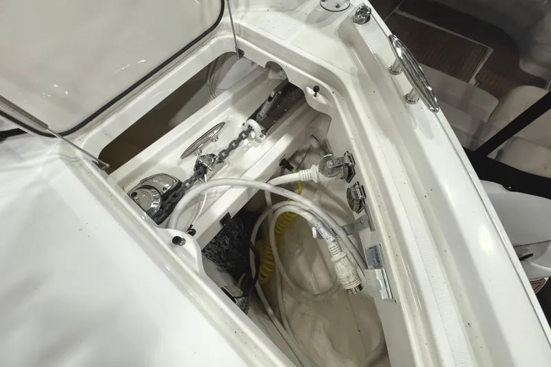 Slide: The Image of 2020 Tiara Yachts C49 Coupe anchor locker with chain and hose storage. - 71