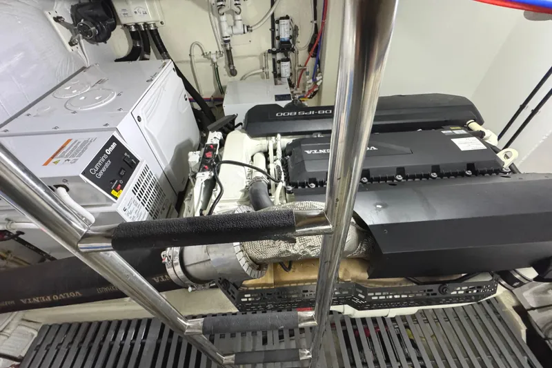 Slide: The Image of Engine room of 2020 Tiara Yachts C49 Coupe with Cummins Onan generator and Volvo Penta engine. - 72