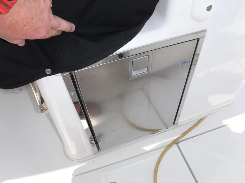 Slide: The Image of Stainless steel compartment on 2014 Boston Whaler 370 Outrage boat deck. - 33