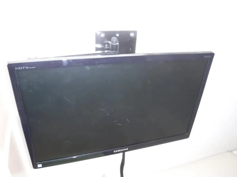 Slide: The Image of Samsung HDTV mounted on a wall, part of a 2014 Boston Whaler 370 Outrage. - 39