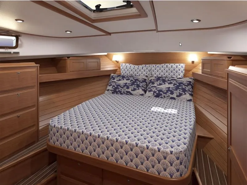 Slide: The Image of Interior of 2027 Sabre 43 Salon Express yacht with wooden helm and ocean view. - 3