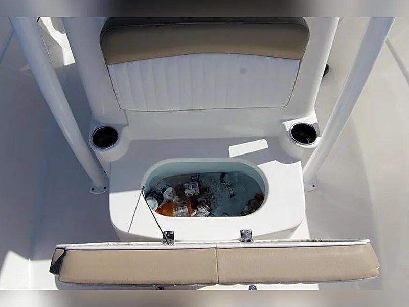 Slide: The Image of 2023 Sea Born LX22 Center Console boat with built-in cooler and cup holders. - 17