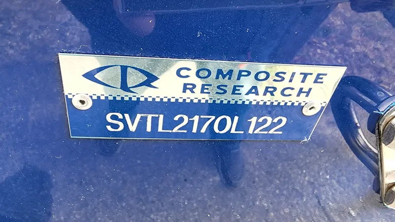 Slide: The Image of 2022 Sea Born LX22 Center Console boat identification plate with Composite Research logo. - 22