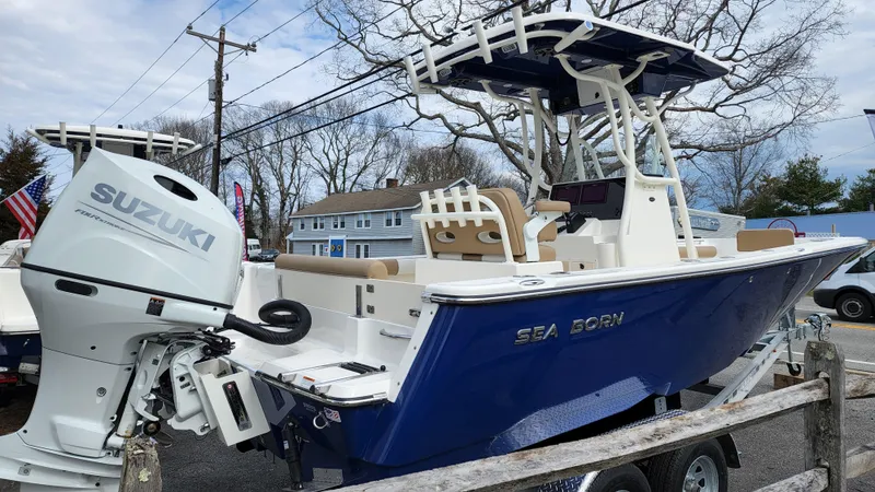 Slide: The Image of 2022 Sea Born LX22 Center Console boat with Suzuki outboard motor. - 3