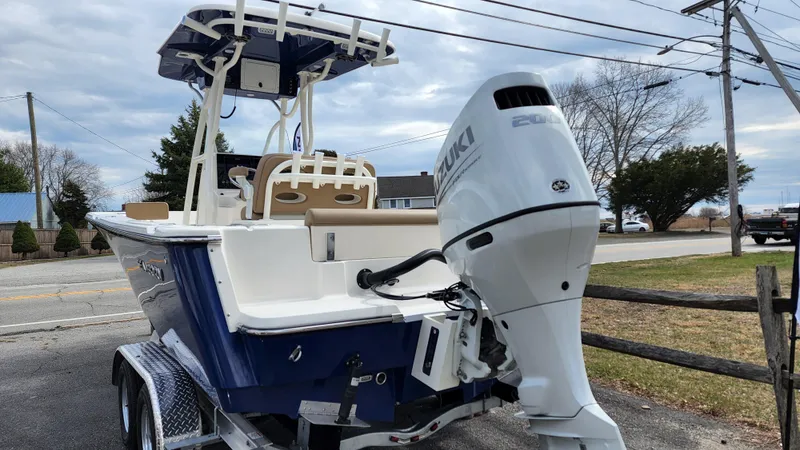 Slide: The Image of 2022 Sea Born LX22 Center Console boat with Suzuki outboard motor. - 6