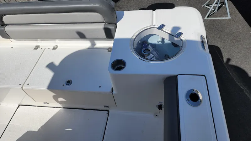 Slide: The Image of 2022 Sea Born LX24 Center Console boat interior with seating and livewell. - 13