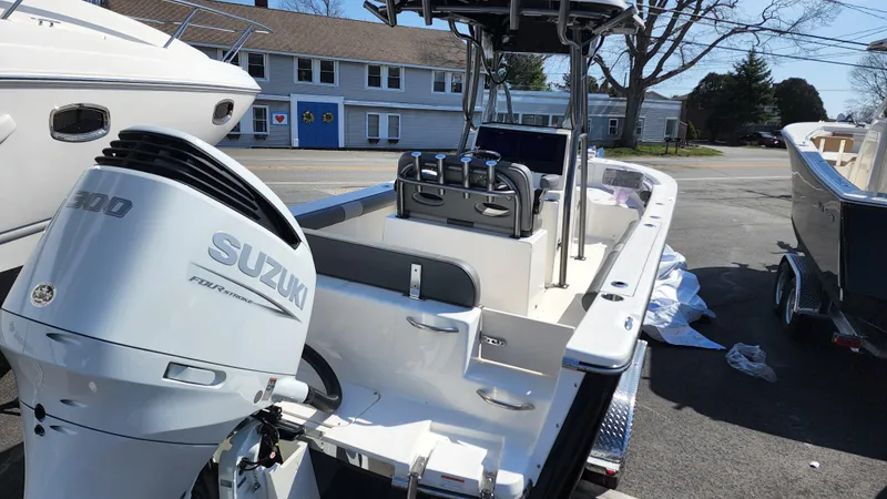 Slide: The Image of 2022 Sea Born LX24 Center Console boat with Suzuki 300 outboard motor. - 17