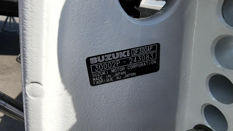 Slide: The Image of Suzuki DF300AP engine label on a 2022 Sea Born LX24 Center Console boat. - 19