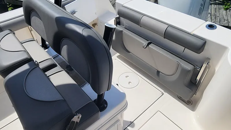 Slide: The Image of 2023 Sea Born SX239 Offshore boat interior seating and storage. - 27