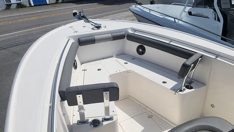 Slide: The Image of 2023 Sea Born SX239 Offshore boat interior with seating and storage compartments. - 28