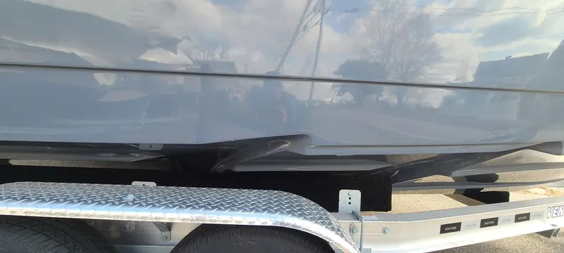 Slide: The Image of 2023 Sea Born SX239 Offshore boat on a trailer, side view. - 4