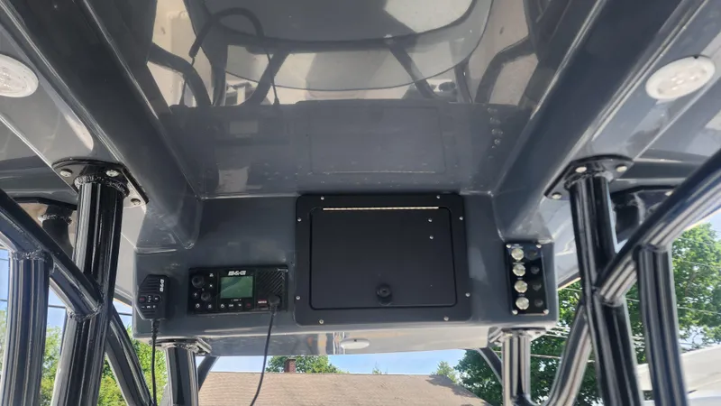 Slide: The Image of 2023 Sea Born SX239 Offshore boat console with electronics and storage compartment. - 40