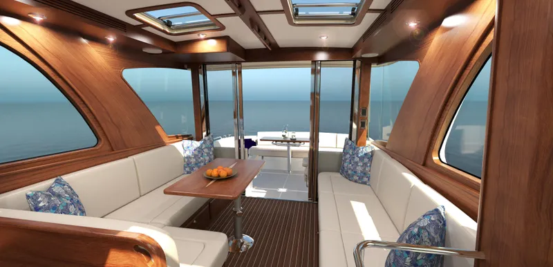 Slide: The Image of Interior of 2025 Sabre 43 Salon Express yacht with luxurious seating and ocean view. - 22